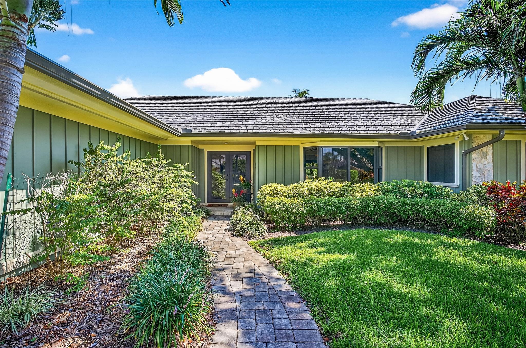 East of A1A ! Couple blocks to beach access. 2024 new electrical panel, 2019 new metal roof, impact windows 2016, new heated lap pool, and spa with travertine decking 2020, 2019 water heater. Obviously, a well maintained home with a great split floorplan. Open kitchen to Family room , granite counters, newer SS appliances, wine cooler, wet bar in great room. Vaulted tounge n groove ceiling, Fireplace. Really, this house has all the features you are looking for. Great family, summer, all year long home !
Close