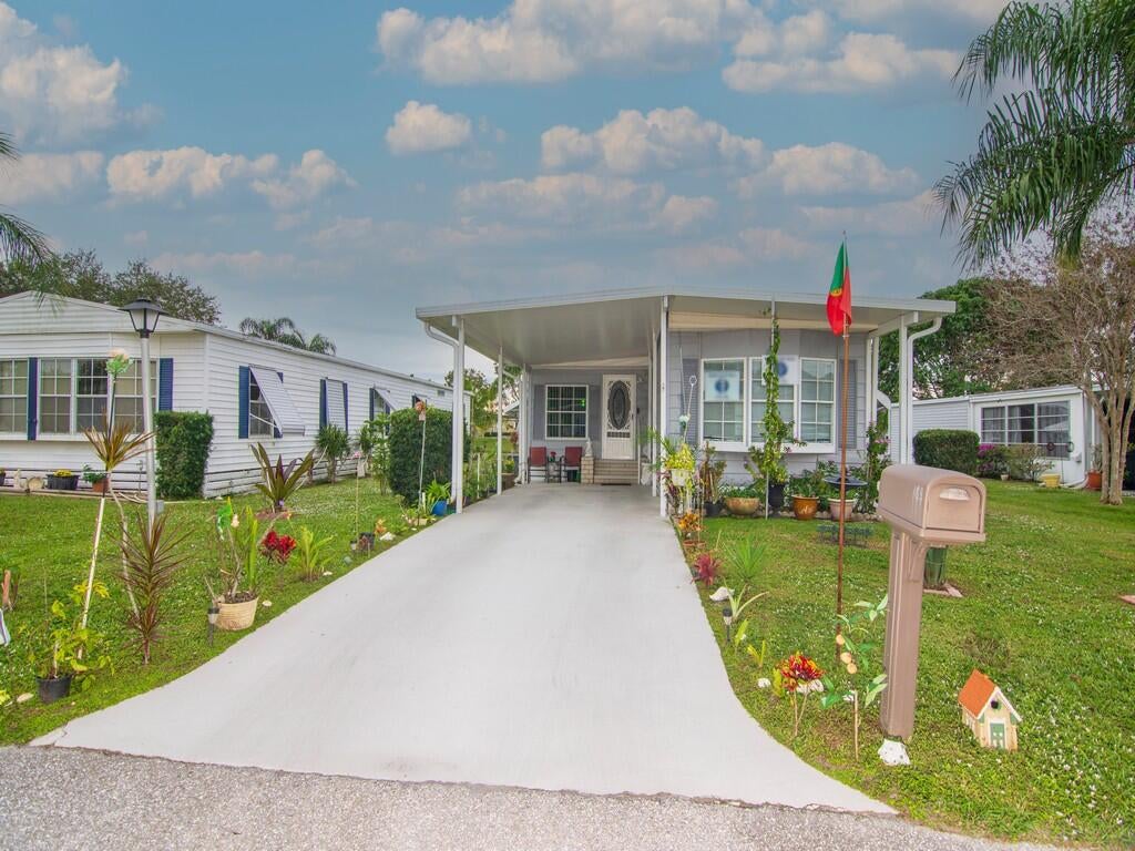 Photo of 183 W Caribbean, Port Saint Lucie, FL 34952 (MLS # R10939408)