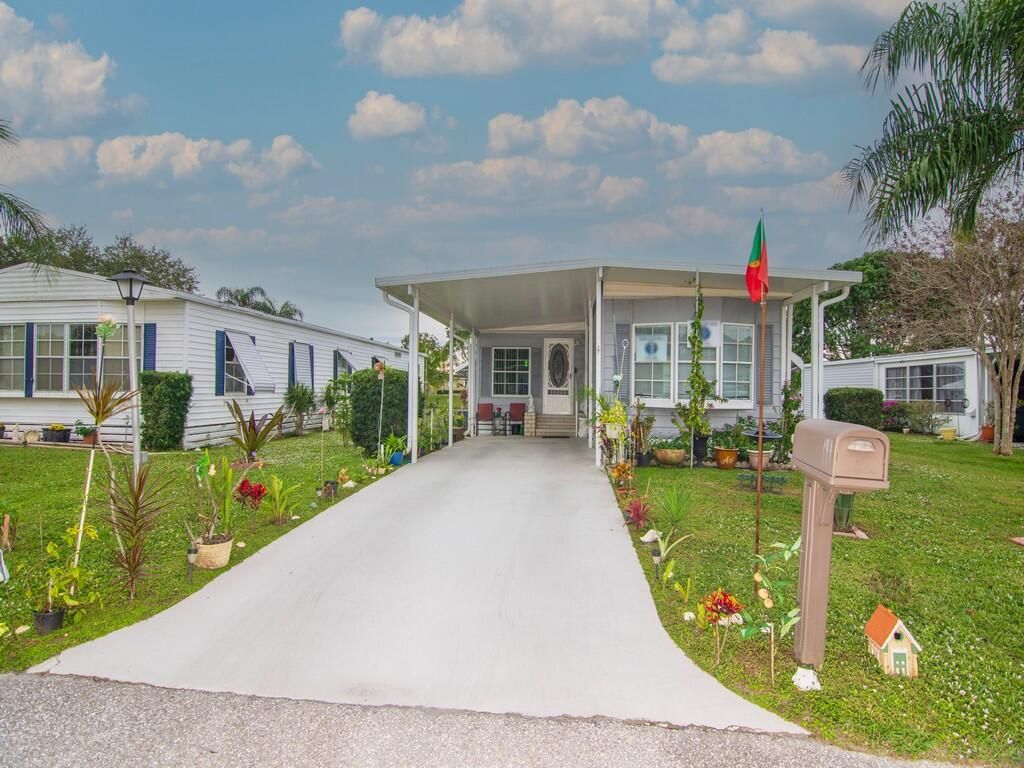 Photo of 183 W Caribbean, Port Saint Lucie, FL 34952 (MLS # R10939408)