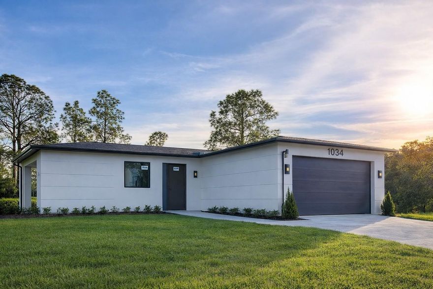 Brand-new modern home filled with natural light, featuring 3 bedrooms, 2.5 baths, and high-end finishes throughout. Enjoy airy, sunlit spaces with sleek flooring, custom closets, and an open-concept kitchen outfitted with premium appliances. Expansive windows offer serene nature views and overlook a peaceful creek—perfectly blending indoor comfort with the beauty of the outdoors. There's plenty of space for a pool, and you're just minutes from shopping, dining, and everything the Florida lifestyle has to offer. Move-in ready and designed for light, style, and relaxation.