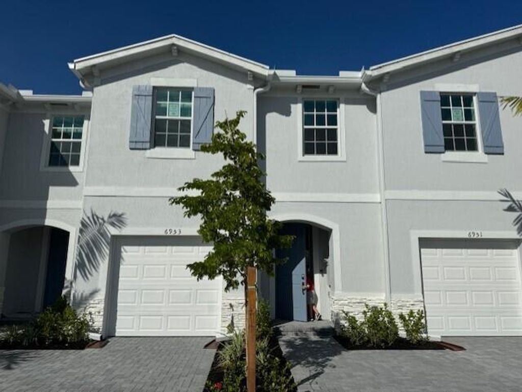 Photo of 6953 Harbours Edge Avenue, Lake Worth, FL 33467 (MLS # B26001893)