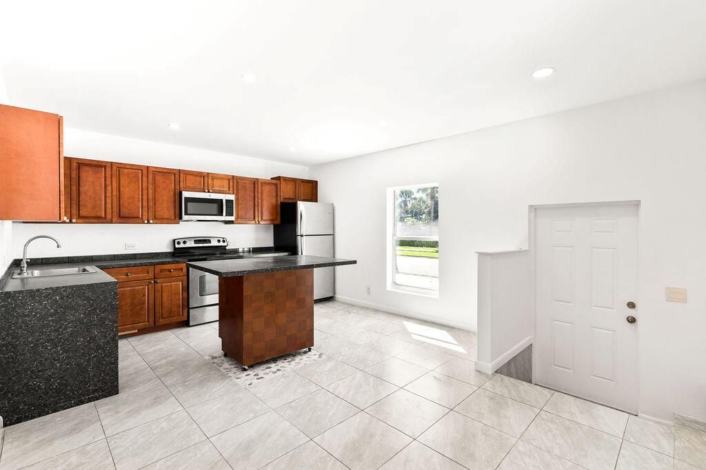 Photo of 137 Hawthorne Drive #B, Lake Park, FL 33403 (MLS # R11142264)