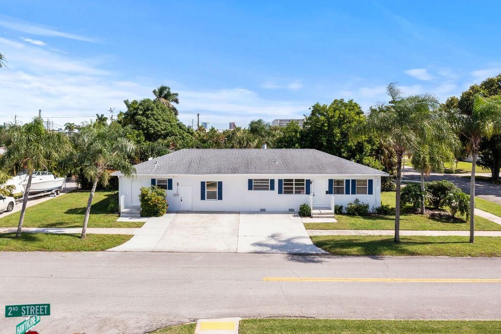 Photo of 137 Hawthorne Drive #B, Lake Park, FL 33403 (MLS # R11142264)