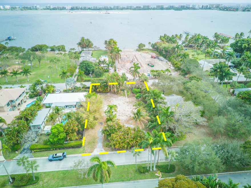 Incredible opportunity to build your dream home on a large lot running through from Palmway to Lakeside.  Multi-million dollar home being constructed across the street on the intracoastal, and in the neighborhood.  Fabulous location close to downtown Lake Wort Beach, West Palm Beach as well as Palm Beach.  Near all conveniences