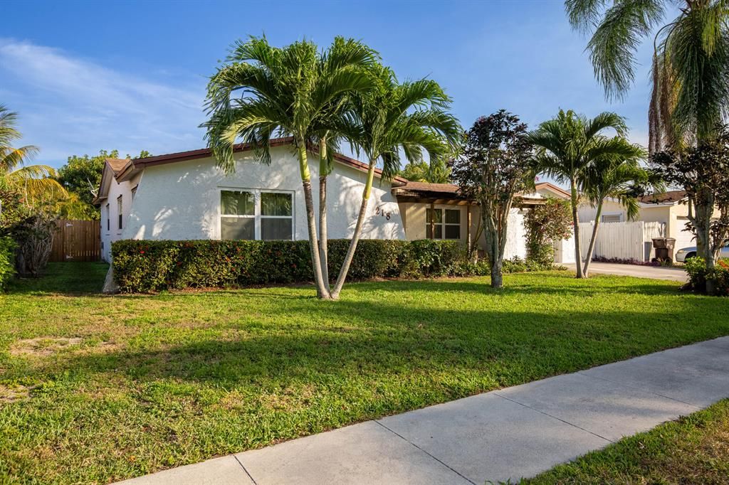 Photo of 218 S Sequoia Drive, West Palm Beach, FL 33409 (MLS # R10881470)