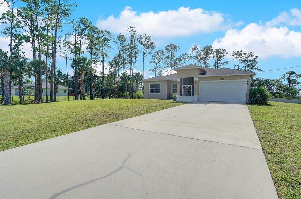 Photo of 18672 91st Place N, The Acreage, FL 33470 (MLS # R11033413)