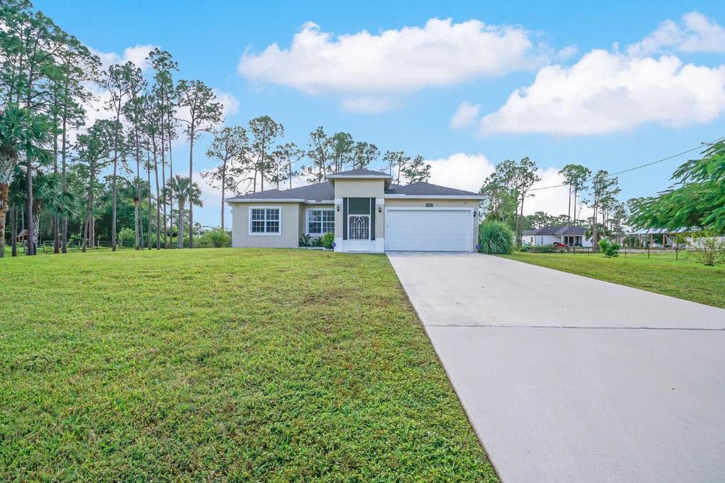 Photo of 18672 91st Place N, The Acreage, FL 33470 (MLS # R11033413)