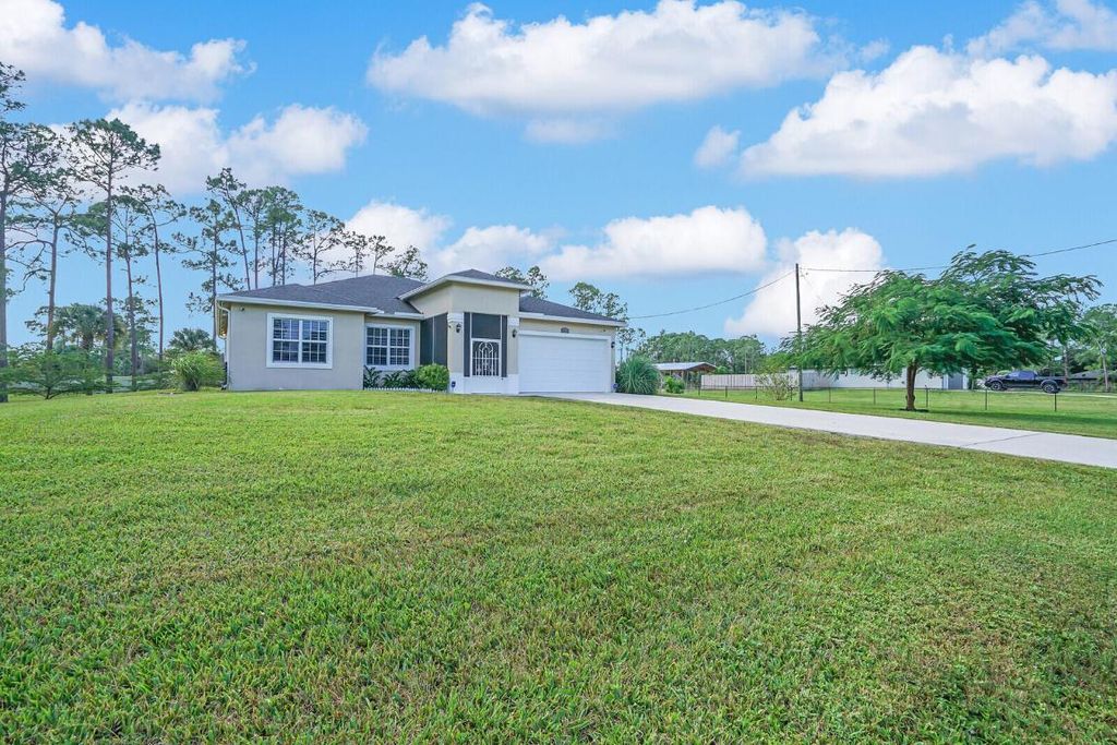 Photo of 18672 91st Place N, The Acreage, FL 33470 (MLS # R11033413)