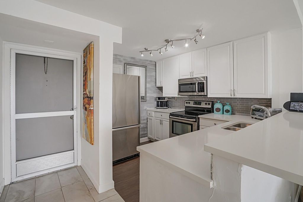 Photo of 1609 N Riverside Drive #304, Pompano Beach, FL 33062 (MLS # F10538051)