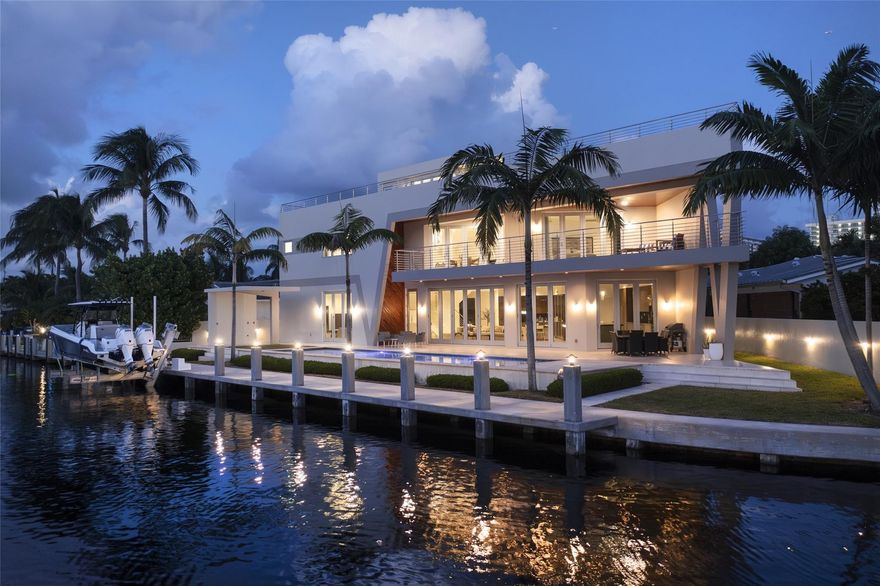 HIGHTLIGHTS: DIRECT INTRACOASTAL VIEWS FROM SEVERAL ROOMS & EXTERIOR | SOLID CONCRETE CONSTRUCTION | IMPACT GLASS | 48K GENERATOR | ELEVATOR TO ALL 3-LEVELS | 50± FT HEATED POOL | SHORT WALK TO THE BEACH. YACHTSMEN: 135± DEEPWATER FRONTAGE | FITS 80-90± FT YACHT AT CANAL TURN|BOAT LIFT. LIVING AREAS: FLOOR-TO-CEILING ACCORDIAN STYLE IMPACT GLASS DOORS | MARBLE FLOORS | INTRACOASTAL VIEWS | CABANA BATH. KITCHEN: PANTRY STORAGE | 14± FT ISLAND TOP WITH IRIDESCENT LEMURIAN BLUE GRANITE | OPENS TO COVERED OUTDOOR DINING & PATIO. PRIMARY BEDROOM SUITE: 2ND LEVEL HAS DIRECT INTRACOASTAL VIEWS | LARGE COVERED TERRACE | UPPER LIVING & SITTING AREA. 2ND LEVEL: 3 BEDROOM SUITES | LIVING MEDIA AREA | PRIMARY BEDROOM | PORCELANOSA TILED DESIGNER BATHROOMS. 3RD LEVEL: CONCRETE ROOF|COMPOSITE DECK