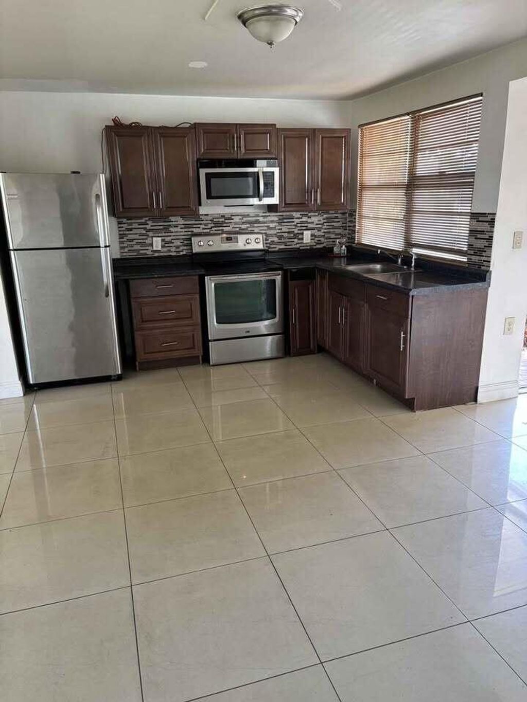 Photo of 1245 N 18th Avenue N, Lake Worth Beach, FL 33460 (MLS # R11103806)