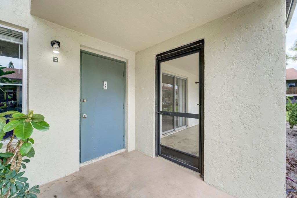 Photo of 6446 Chasewood Drive #B, Jupiter, FL 33458 (MLS # R10958455)