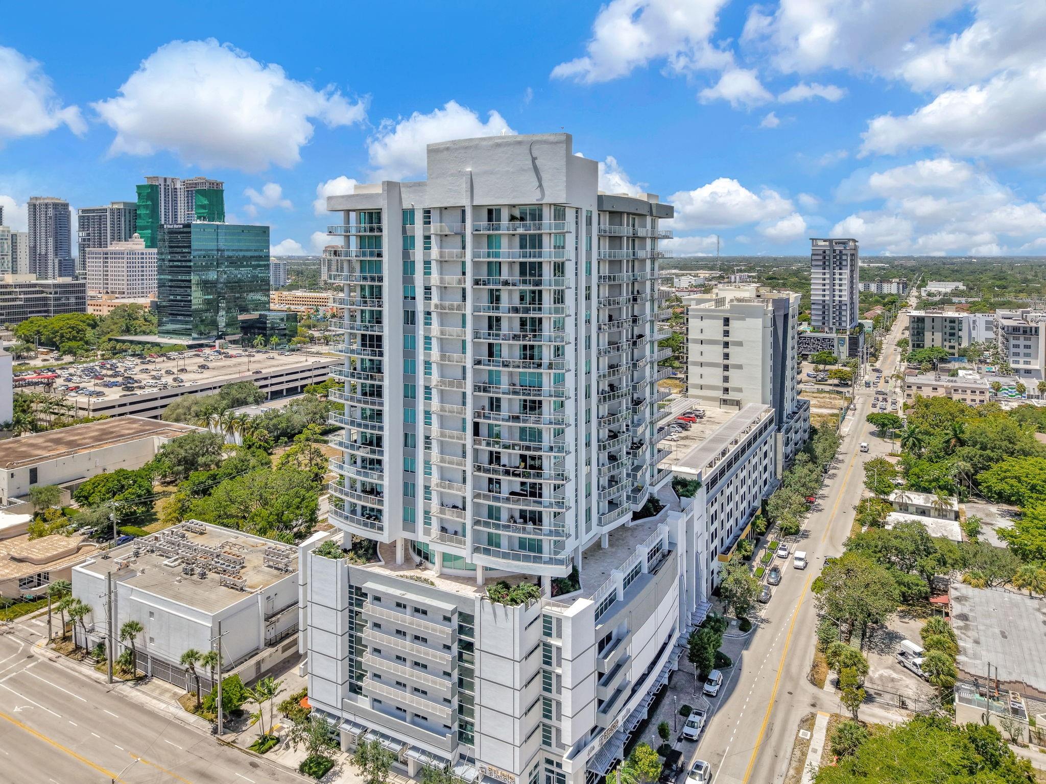 Live in the heart of Fort Lauderdale at Strada, steps to downtown energy, shopping, restaurants, lively nightlife, Las Olas and the beach. This well cared-for residence showcases sweeping skyline views from a generous open balcony. Sunlit interiors feature high ceilings, impact windows, and an open kitchen with quartz counters and premium stainless appliances. Enjoy an in-unit hot tub, TWO parking spaces and basement storage. Full-service building with 24/7 security, fitness center, heated pool, spa, social room, business center and pet-friendly policy. With so many comforts on site, staying in feels like a resort. Brightline station is just moments away for effortless commuting and easy getaways. Steps to everything, or get to the beach in minutes. Urban ease and skyline living await.