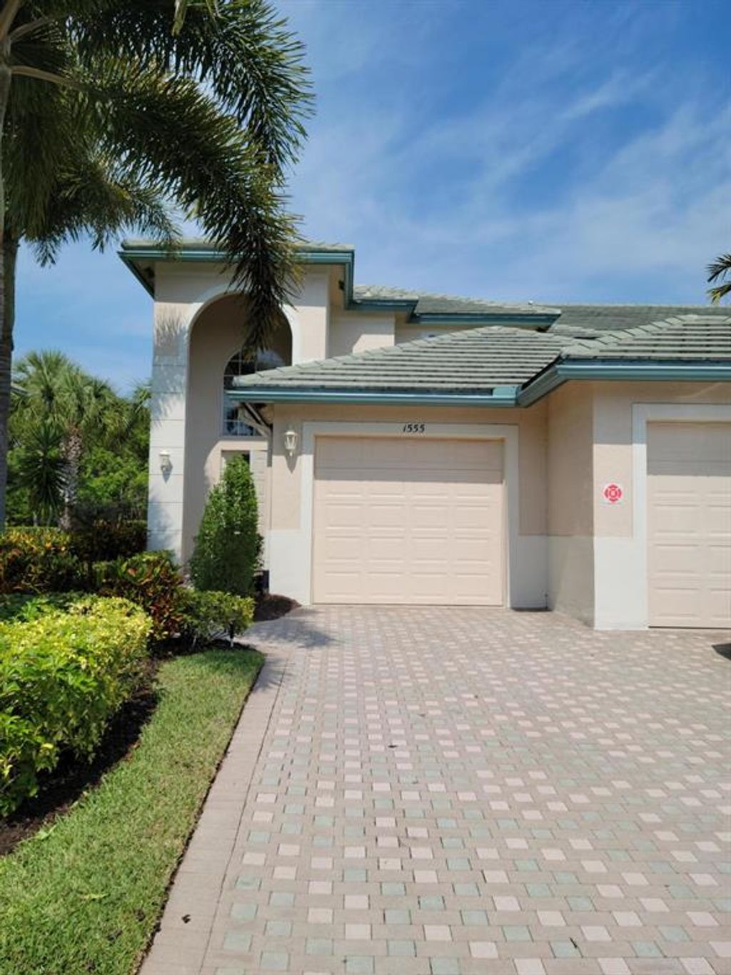 Photo of 1555 SE Prestwick Lane Ln #4, Port St Lucie, FL 34952 (MLS # R10708148)