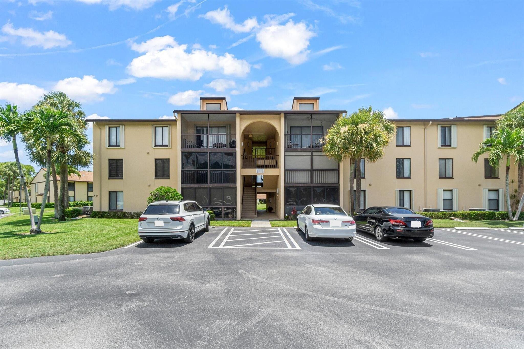 ADULT 55+ Community. Welcome to this charming 2nd floor corner unit offering 2 Bedrooms, 2 Bathrooms, bright natural light, impact windows, screened covered patio with accordion shutters. Featuring a spacious layout with tile and carpet flooring, includes remodeled kitchen with custom built cabinets with pantry, granite countertop & newer appliances. Generously sized Primary Bedroom with walk-in closet, Remodeled Master Bathroom with linen closet & walk-in shower. Monthly condo fee covers: Comcast cable, water, exterior maintenance, building insurance, 2024 roof, shared grill area & amenities, 2 vehicles permitted, pick-up trucks, motorcycles, 1 pet. Great location, close to Publix shopping center, restaurants, parks, library, beaches, airport, easy access to I-95 & Turnpike.