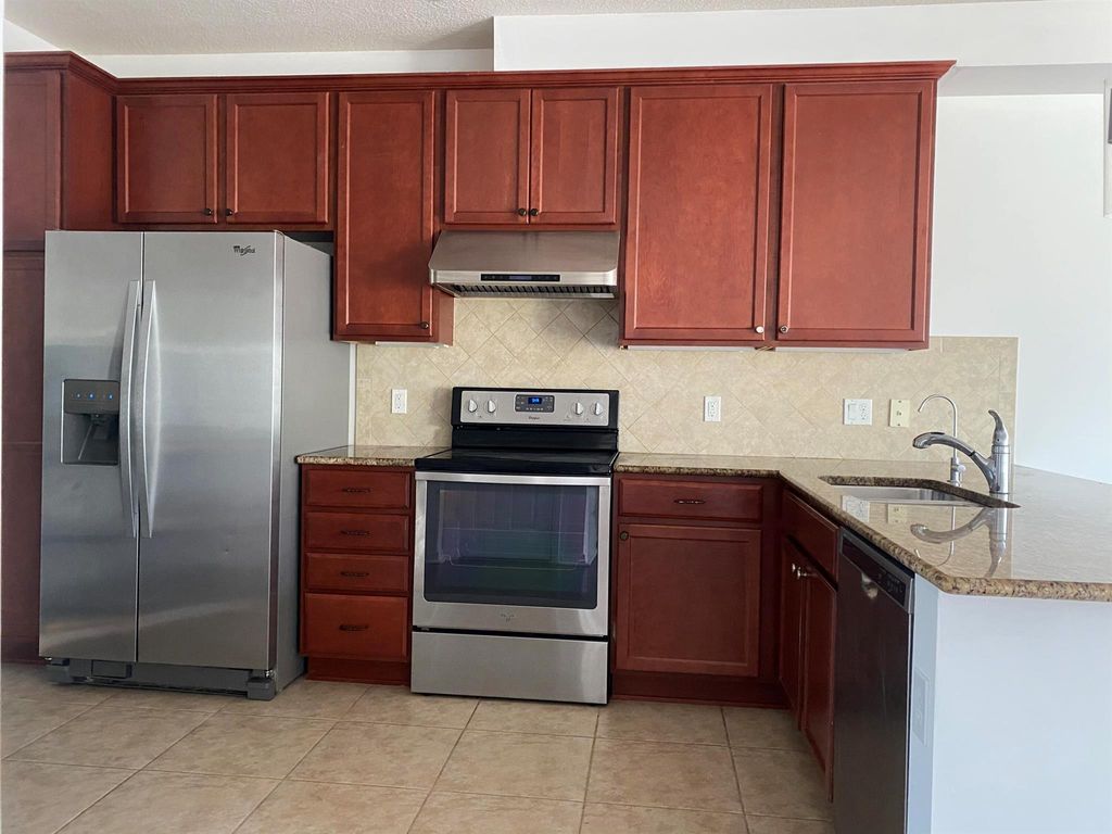 Photo of 1065 N Prescott Drive N, Jupiter, FL 33458 (MLS # R11007829)