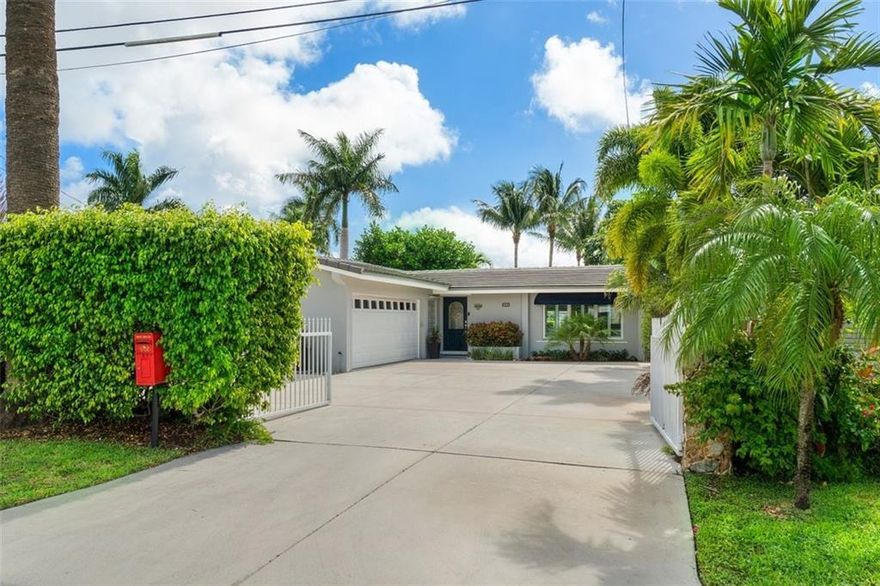 Spacious open floor plan w/ sparkling pool and water views from Living area and Primary bedroom. Living area boasts vaulted ceilings, original fireplace enhanced w/ custom built-ins. Newer open kitchen w/ quartz counters, stainless appliances, and breakfast counter. Gracious covered patio. Tile Roof 2018, AC 2020, and updated electric panel. Situated on oversized 11,027 SF lot!!  180’ deep w/ 60’ of frontage, 26’ boat dock, deck, and davits.  Waterfront lifestyle of kayaking, paddleboarding, jet skiing and boating awaits with direct access to the Middle River and just 2 fixed bridges to the Intracoastal & Ocean. Huge circular driveway, plus oversized two car garage w/new impact garage door. Poinsettia Hgts is one of the most sought after areas of FTL with an ultra convenient location!