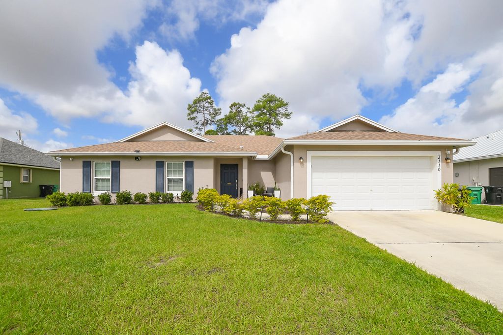 Photo of 3110 SW Curcuma Street, Port Saint Lucie, FL 34953 (MLS # B26014034)
