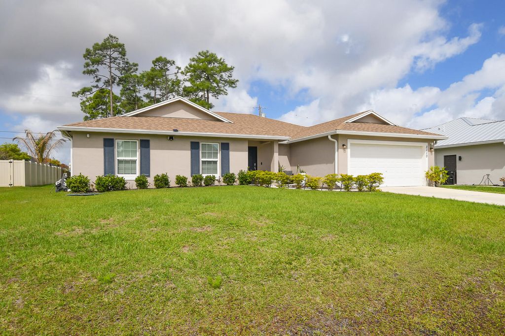 Photo of 3110 SW Curcuma Street, Port Saint Lucie, FL 34953 (MLS # B26014034)