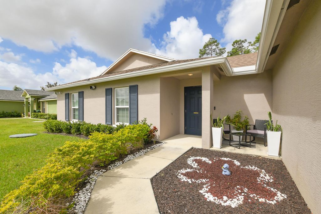 Photo of 3110 SW Curcuma Street, Port Saint Lucie, FL 34953 (MLS # B26014034)