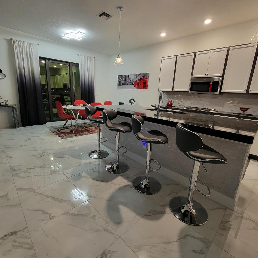 Photo of 15750 LONGBOAT KEY Drive, Westlake, FL 33470 (MLS # B26080378)
