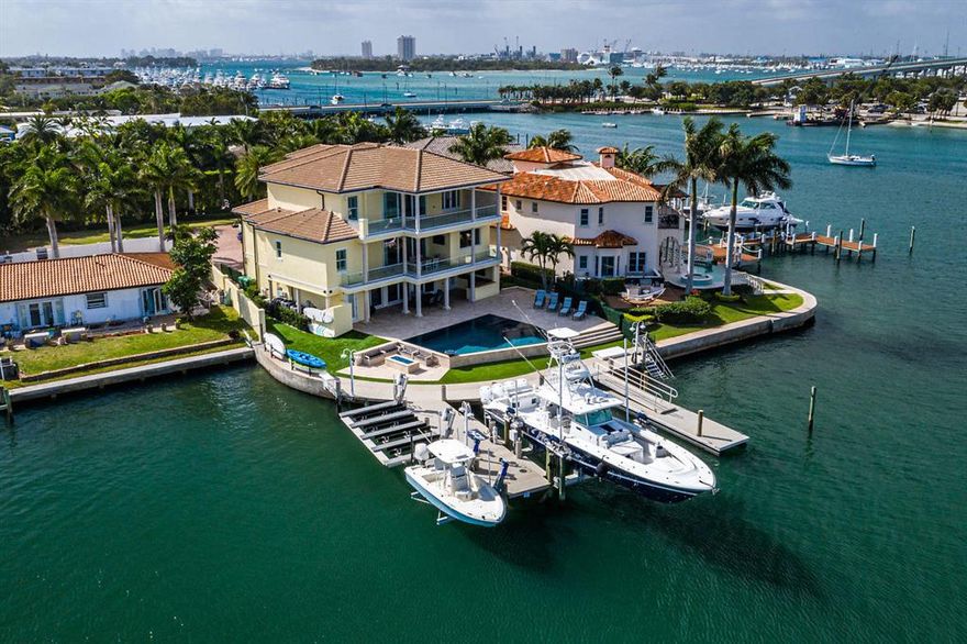 Welcome to Singer Islands first and only three-story home, situated on peninsula of the small gated community of SOPHIA SENECA ESTATES. With  115 feet of wide water views this 2017 custom built gem offers breathtaking water views from all three levels. High end finishes throughout. PLease see detailed List Sheet in Document sectionDocks and Lifts:Two Docks made out of Trex docking material, one of which is a floating dock To Boat Lift 50,000 lbs., 10,000 lbs. as well as a 5,000 lbs. lift set up for 4 Jet Ski'sPool:Infinity edge Pebble Teck heated and chilled saltwater pool with Jacuzzi, pool is self-filling. Pool side gas fire bowl features5 Bedroom with 5 Full and 1 Half Bathroom