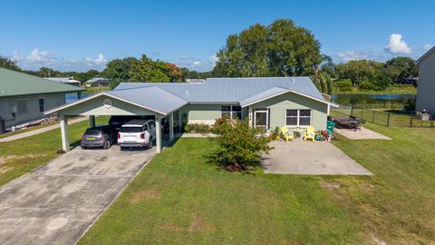 Photo of 2477 SE 27th Street, Okeechobee, FL 34974 (MLS # R11135429) Photo of 2477 SE 27th Street, Okeechobee, FL 34974 (MLS # R11135429)