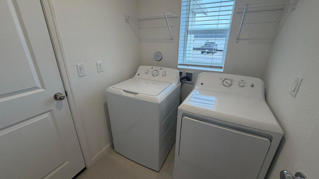 Photo of 5876 NW Fairfox Way, Port Saint Lucie, FL 34987 (MLS # R11151836)