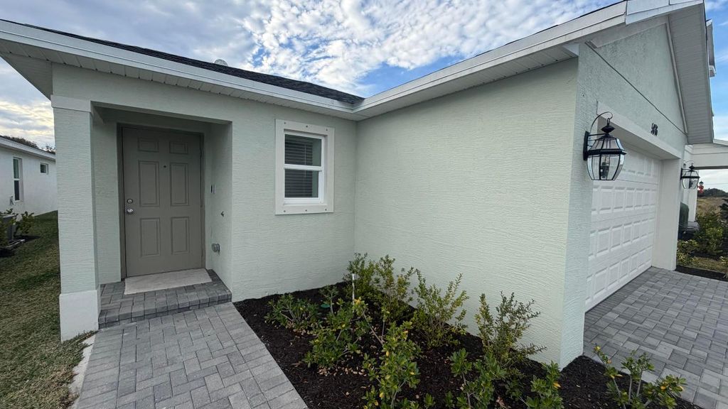 Photo of 5876 NW Fairfox Way, Port Saint Lucie, FL 34987 (MLS # R11151836)