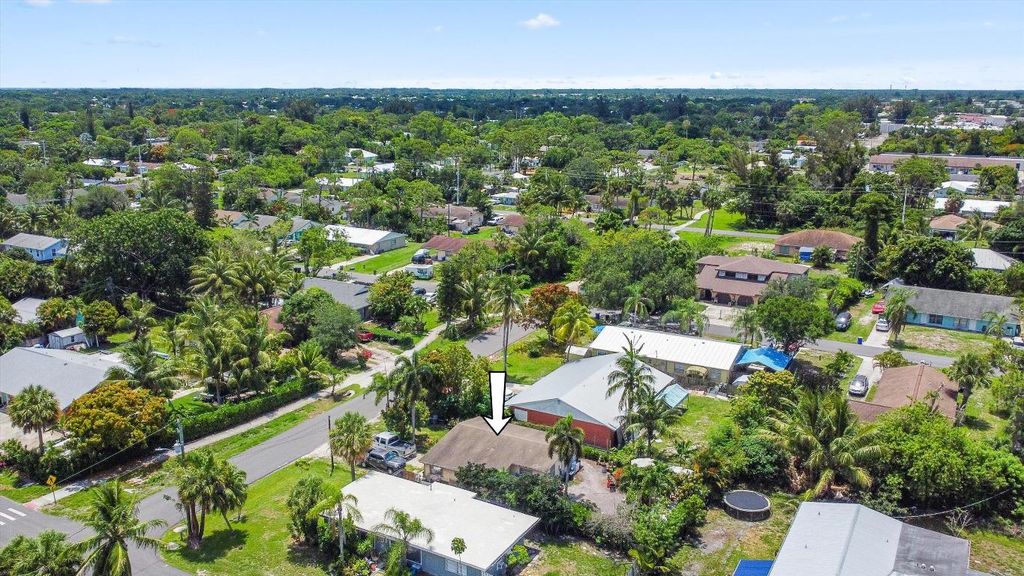 Photo of 3044 SE Camino Avenue, Stuart, FL 34997 (MLS # R11095727)