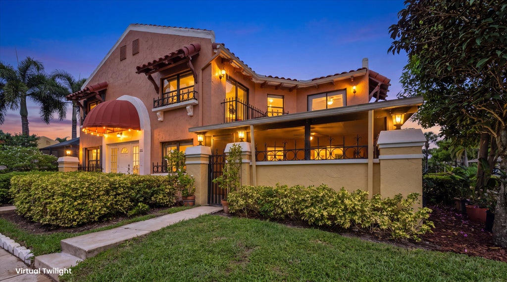 Photo of 24 Uno Lago Drive, Juno Beach, FL 33408 (MLS # B26079169)