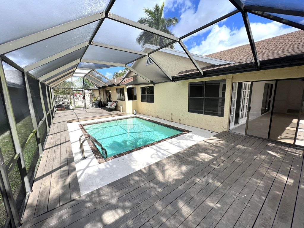 Photo of 1095 NW 19th Terrace, Delray Beach, FL 33445 (MLS # R11100820)