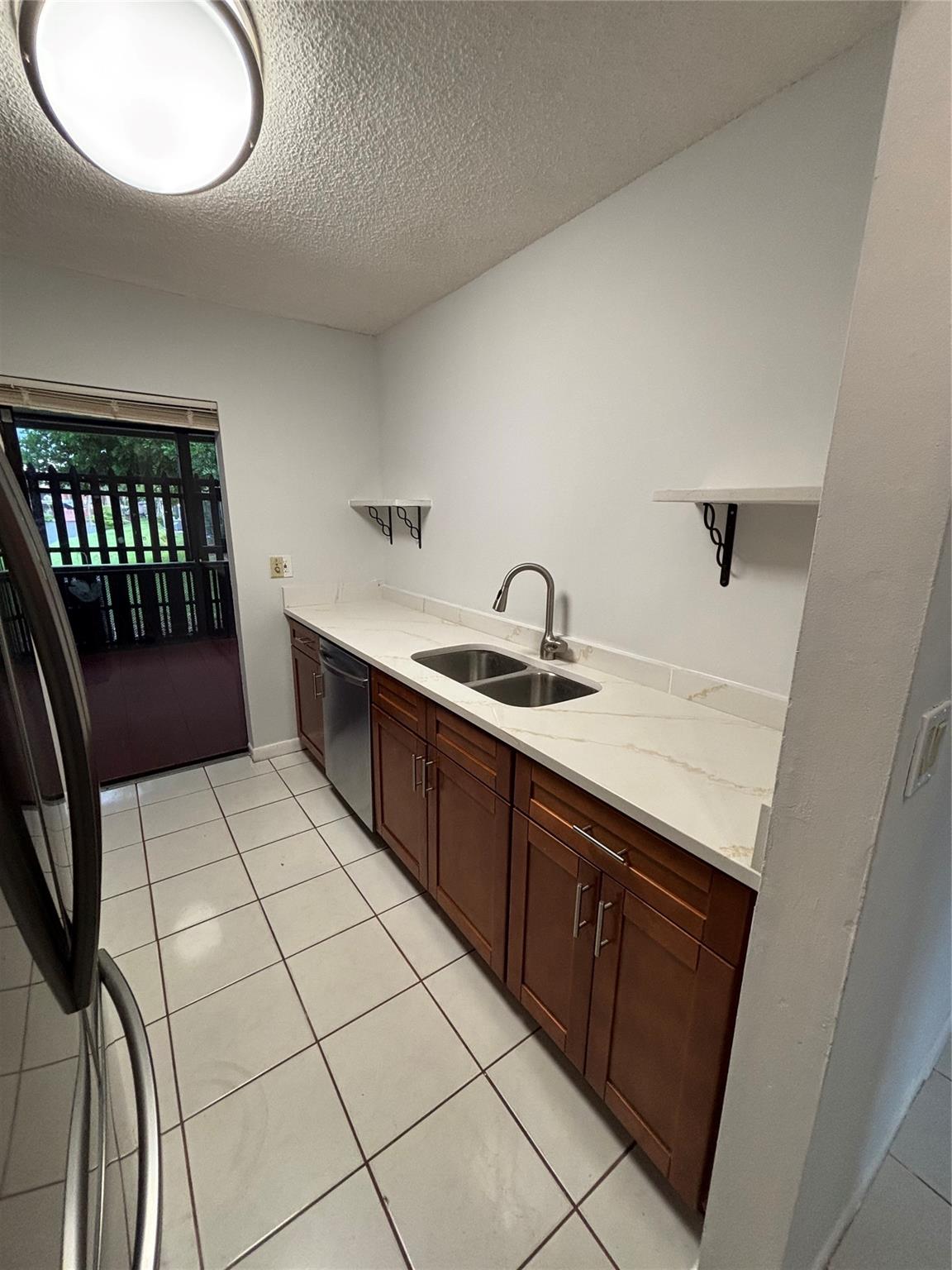 Woodscape Twnhms Condo - Residential Lease