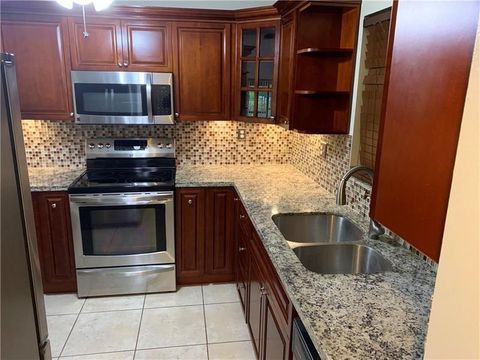 Tiny photo for 2830 Riverside Drive #102-a, Coral Springs, FL 33065 (MLS # F10542874)