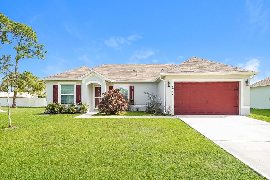 Photo of 3043 SW Lucerne Street, Port Saint Lucie, FL 34953 (MLS # R10957186)