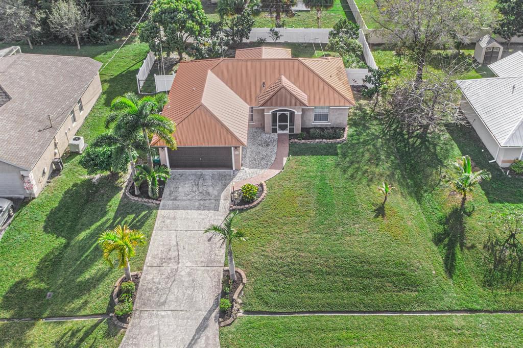 Photo of 1342 SW Leisure Lane, Port Saint Lucie, FL 34953 (MLS # R10685259)