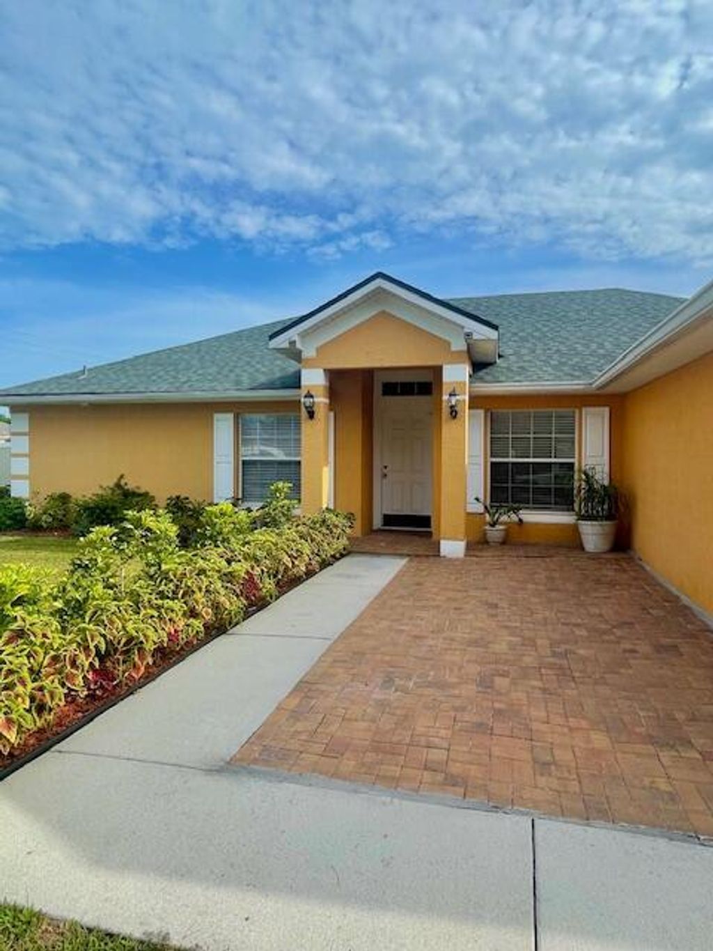 Photo of 1281 SW San Esteban Avenue, Port Saint Lucie, FL 34953 (MLS # R11106752)