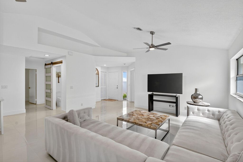 Photo of 2218 NW 52nd Street, Boca Raton, FL 33496 (MLS # B26021730)