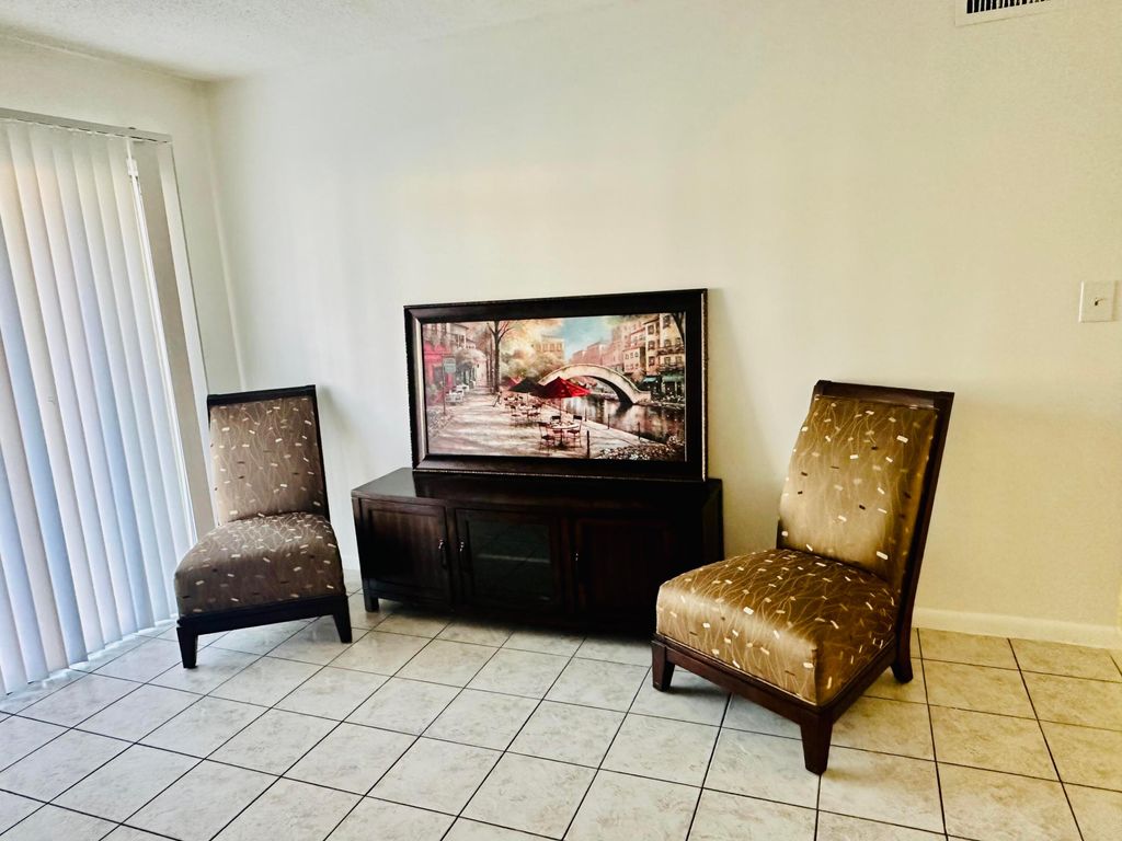 Photo of 6054 Forest Hill Boulevard #102, West Palm Beach, FL 33415 (MLS # B26014520)