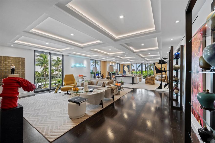 Custom designed by a renowned designer for a distinctive art collection and comfortable living, this stunning gut renovated 3/3.1 is the perfect match!. Located on premier Worth Avenue in the most sought-after oceanfront boutique condo, the flow and room proportions have been thoughtfully conceived to accommodate the most discerning Palm Beach lifestyle. The grand foyer sets the stage for the spacious formal living room and den with walls of glass on the ocean and a generous terrace. Adjacent to these easy living areas is a large dining room. There is a dedicated bar room and onyx clad powder room cleverly camouflaged by paneling, yet convenient for guests. All of the bedrooms have wonderful views of the ocean as well as the living areas!