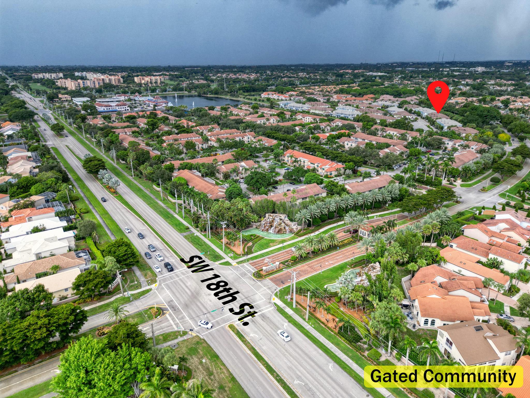Rare opportunity. Elegant East Boca Raton community, Pointe 100, located near major roads (I-95), public beaches, restaurants, houses of worship, upscale Town Center Mall, food shopping & A-Rated Palm Beach County public schools. Pointe 100 is gated & located within the Boca Pointe development, which offers optional golf club membership. Newer home, built 2016, w/ 4 beds, 3 1/2 baths w/ Pointe 100 community pool & gym incl. Main bedroom on FIRST floor w/ ensuite bath. Remaining bedrooms are located on 2nd floor with extra loft space. Boasts 2 car garage & more room on carport. Stylish in appearance, comfortable in feel - schedule a private showing today.