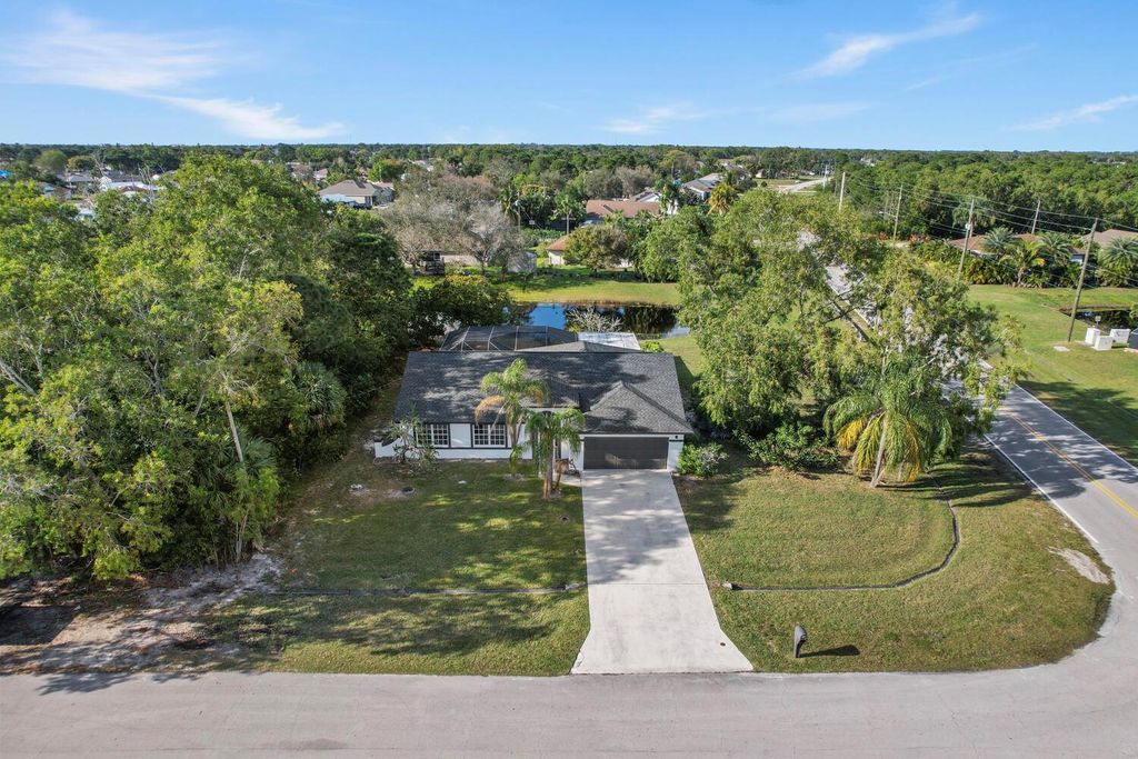 Photo of 2400 SE Charleston Drive, Port Saint Lucie, FL 34952 (MLS # R10956302)