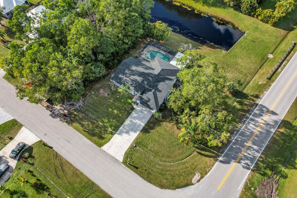 Photo of 2400 SE Charleston Drive, Port Saint Lucie, FL 34952 (MLS # R10956302)