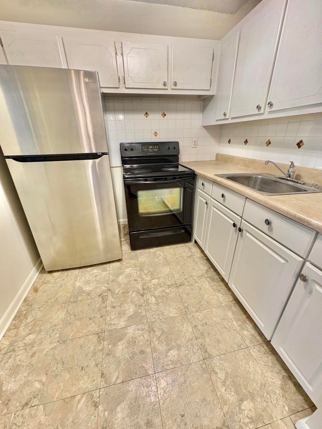 Photo of 63 Coventry C, West Palm Beach, FL 33417 (MLS # B26062302)