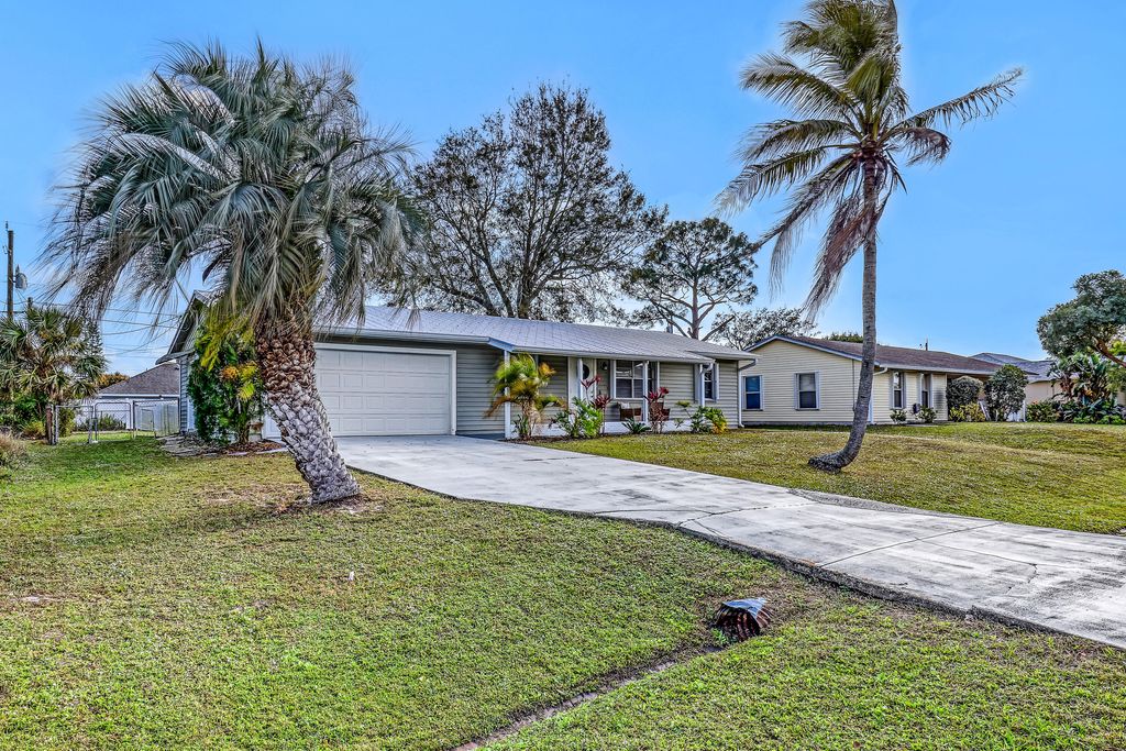 Photo of 1925 SW Idaho Lane, Port Saint Lucie, FL 34984 (MLS # R11107544)