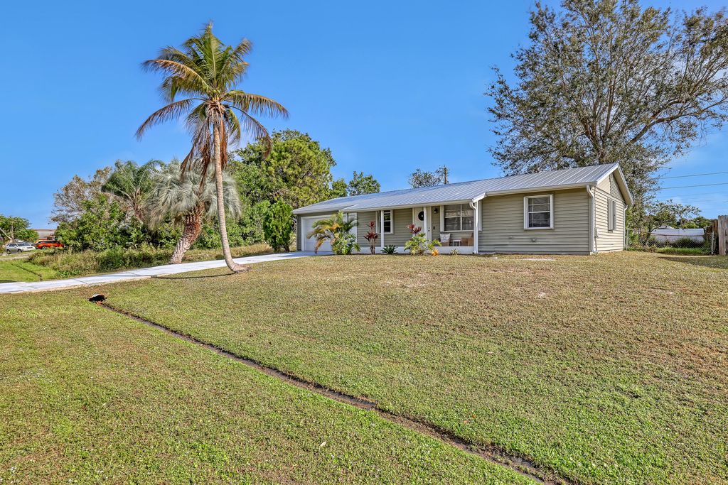 Photo of 1925 SW Idaho Lane, Port Saint Lucie, FL 34984 (MLS # R11107544)