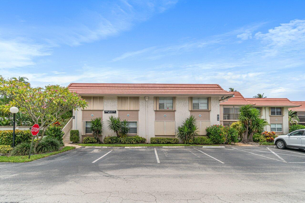 Welcome Home to your new beautiful East Boca garden view 2 bedroom and 2 bathroom condo. This impeccable maintained home features ceramic tile floors, new AC and open floor plan. Natural light fills this home as you enjoy mornings on your screened in patio. Great layout for everyone to feel at home in this 55+ active community. Close to shopping, 95, Boca Regional, and the best Boca has to offer. Boca Linda Community offers large pool with club house and reading room.