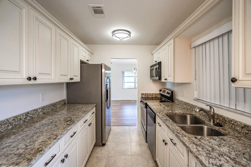 Photo of 6309 Summer Sky Lane, Greenacres, FL 33463 (MLS # B26024733)