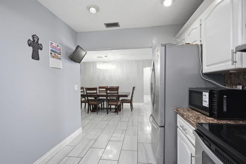 Tiny photo for 1301 SW 75th Avenue, North Lauderdale, FL 33068 (MLS # B26048497)
