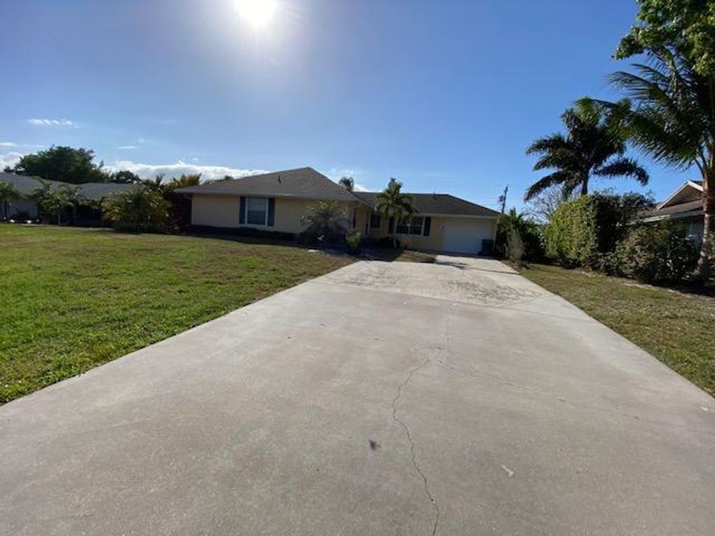 Photo of 1990 SE Cheltenham Street, Port Saint Lucie, FL 34983 (MLS # R10701758)